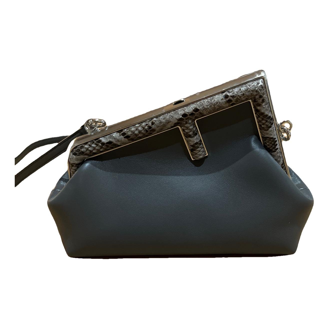 First leather handbag