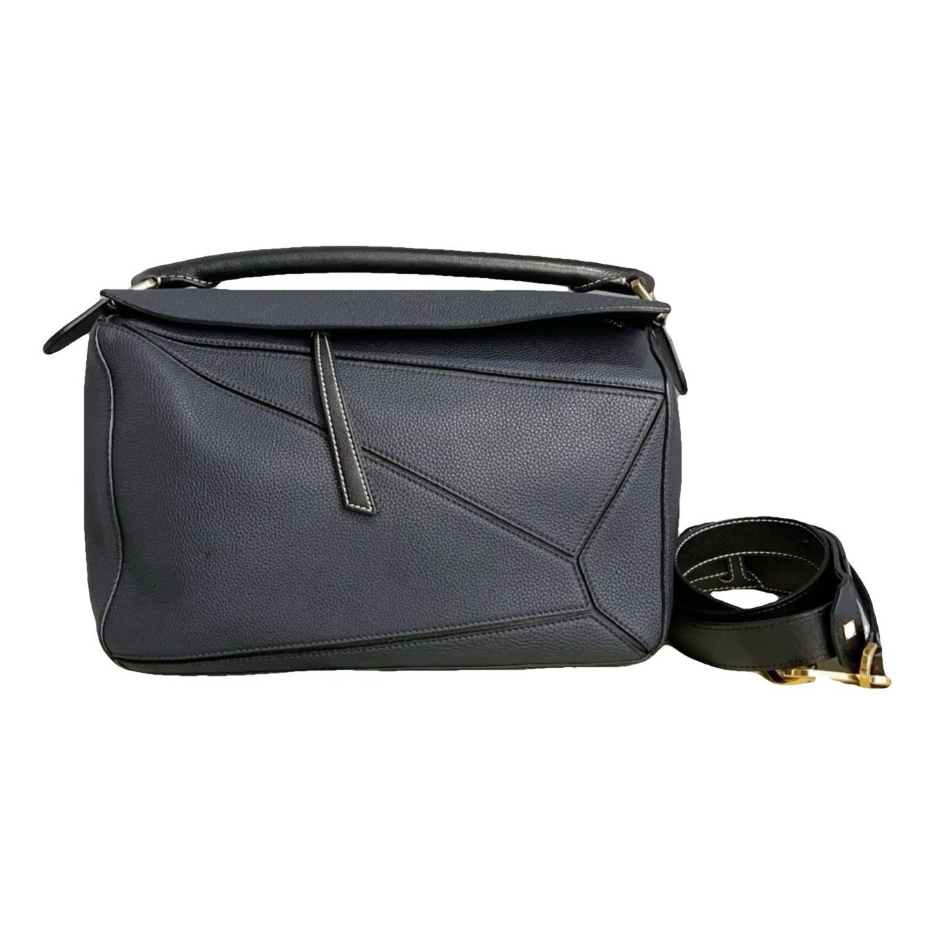 Puzzle leather handbag