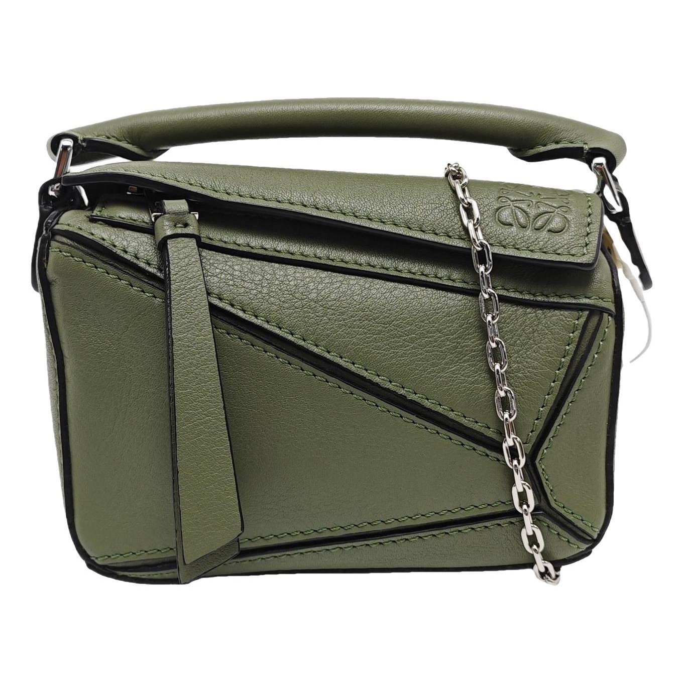 Puzzle leather handbag