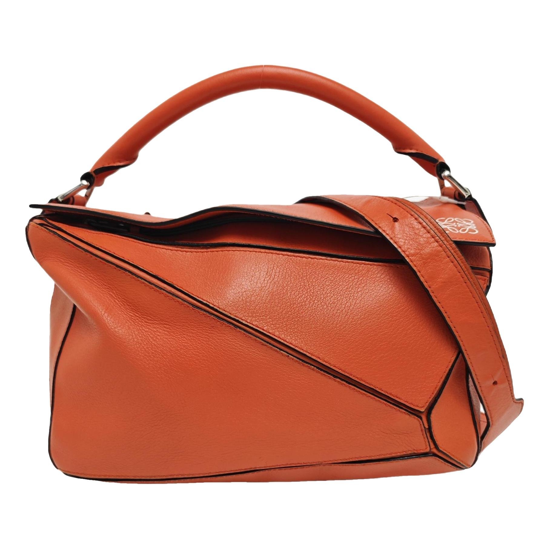Puzzle leather handbag