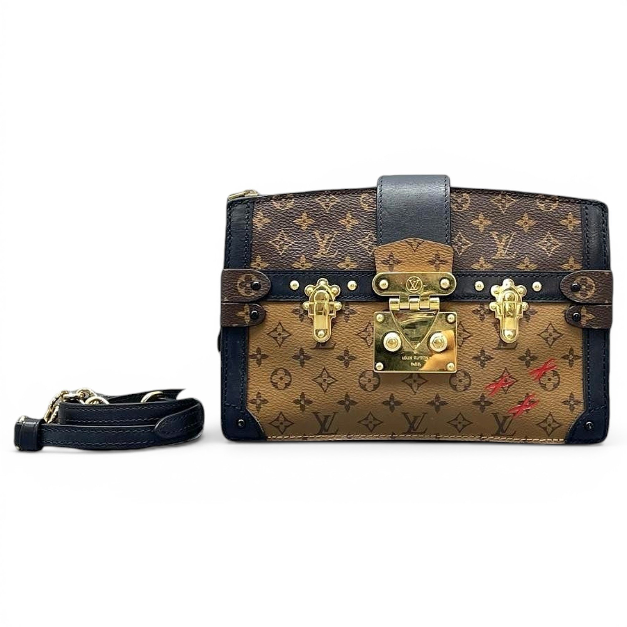 Pochette Trunk leather handbag