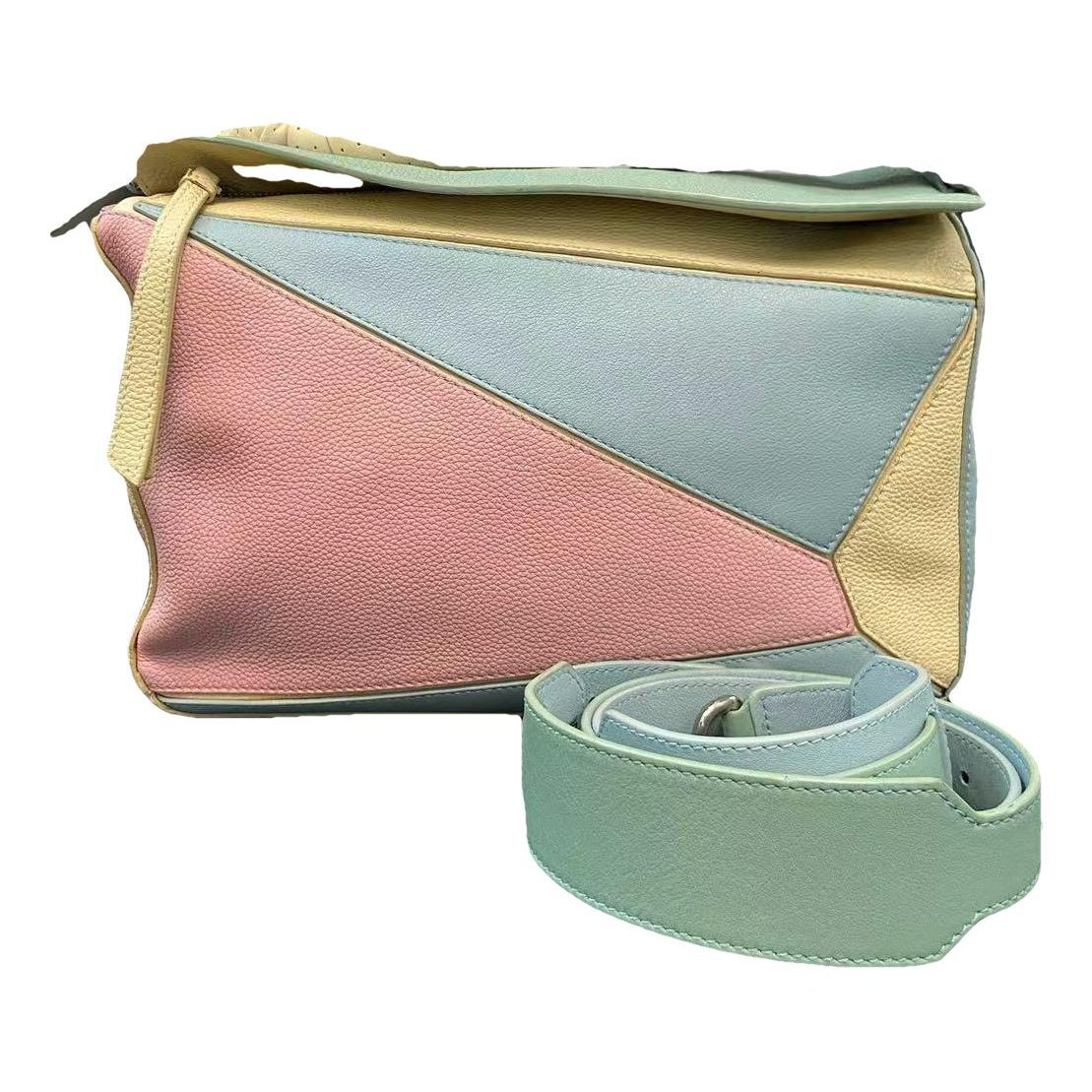 Puzzle leather handbag