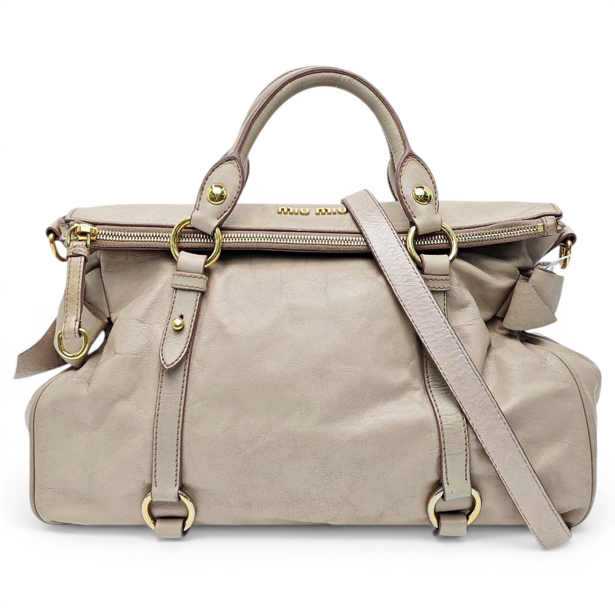 Bow bag leather handbag