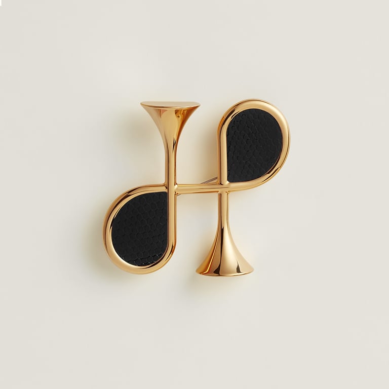 Cor H brooch