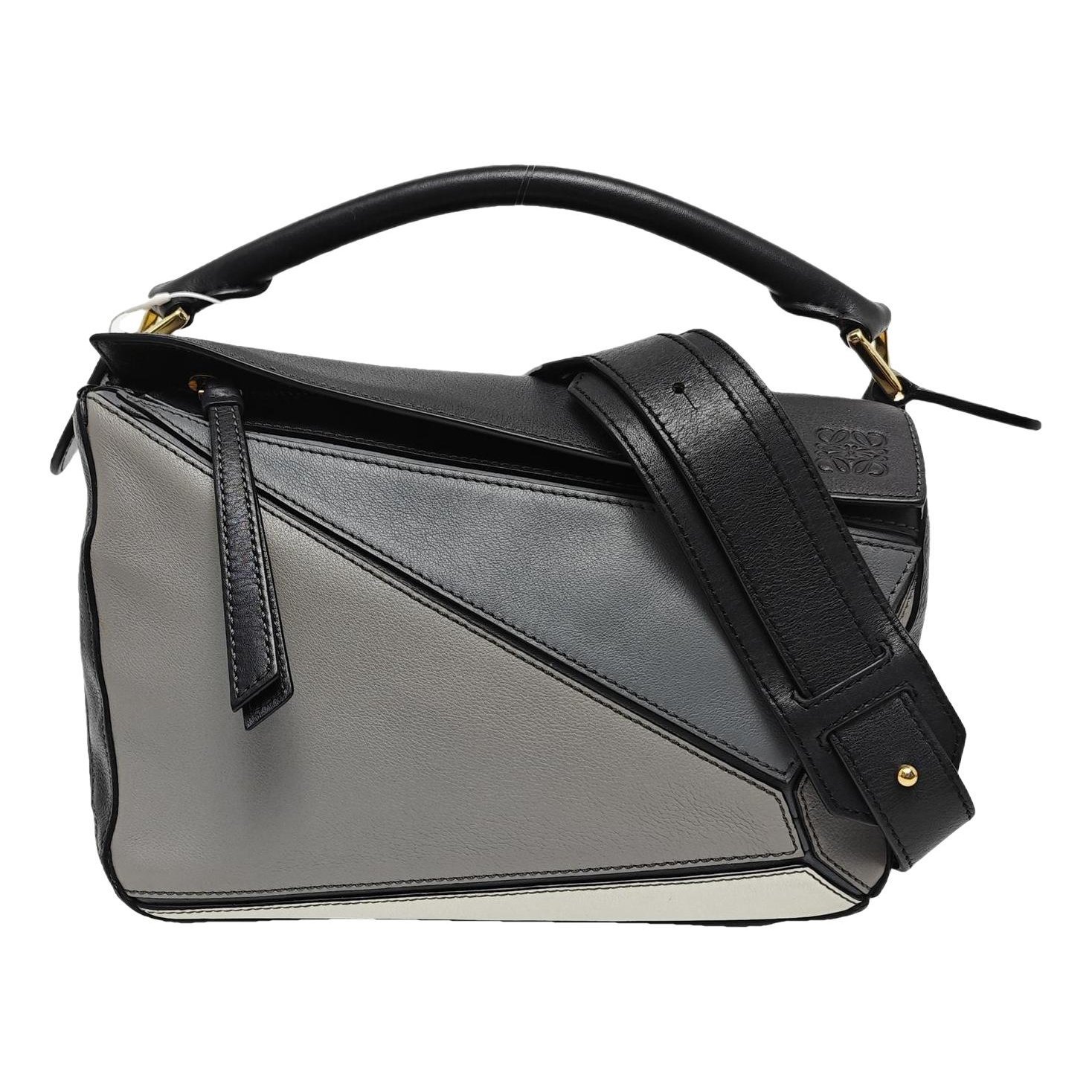 Puzzle leather handbag