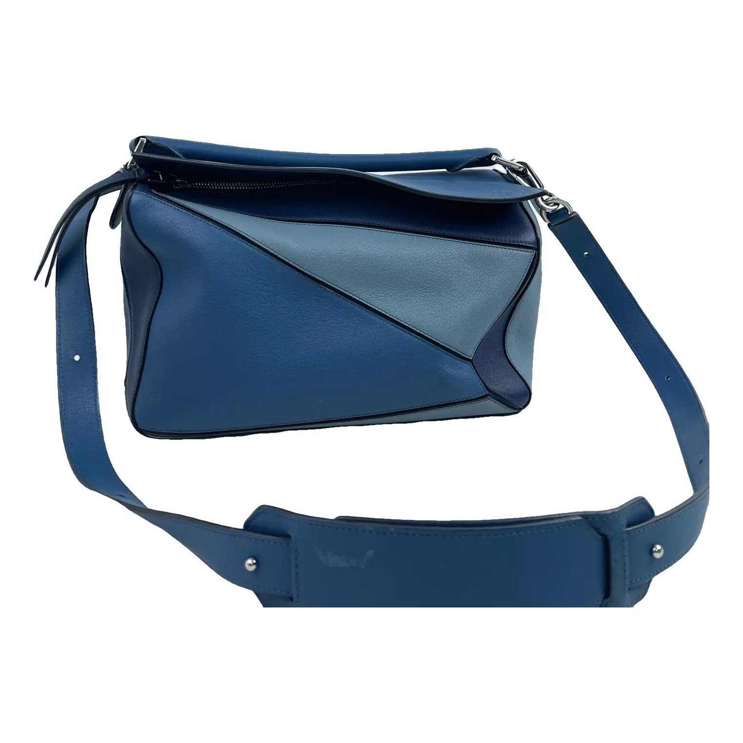 Puzzle leather handbag