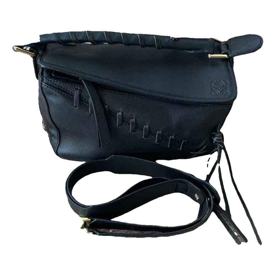 Puzzle leather handbag