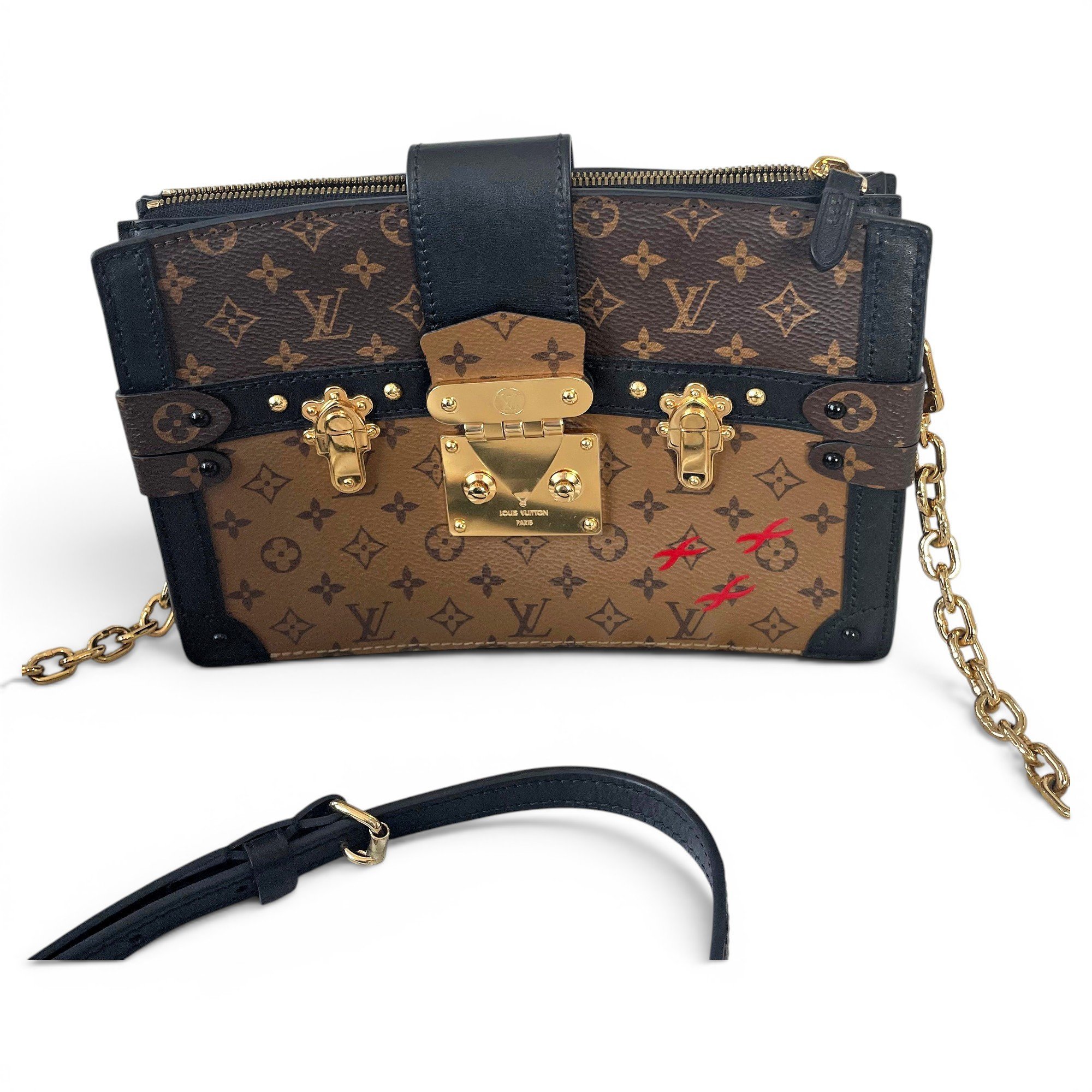Pochette Trunk leather handbag