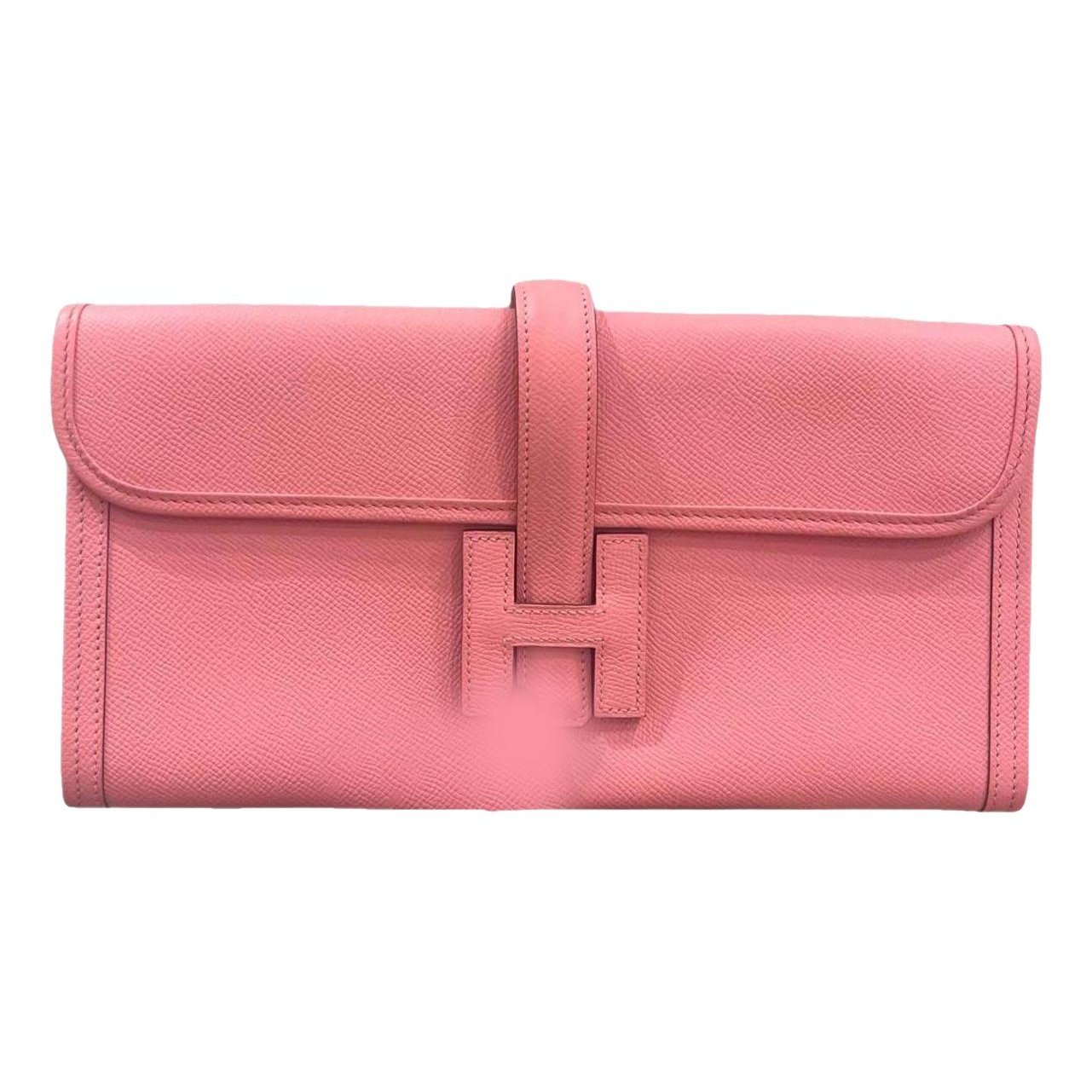 Jige leather clutch bag