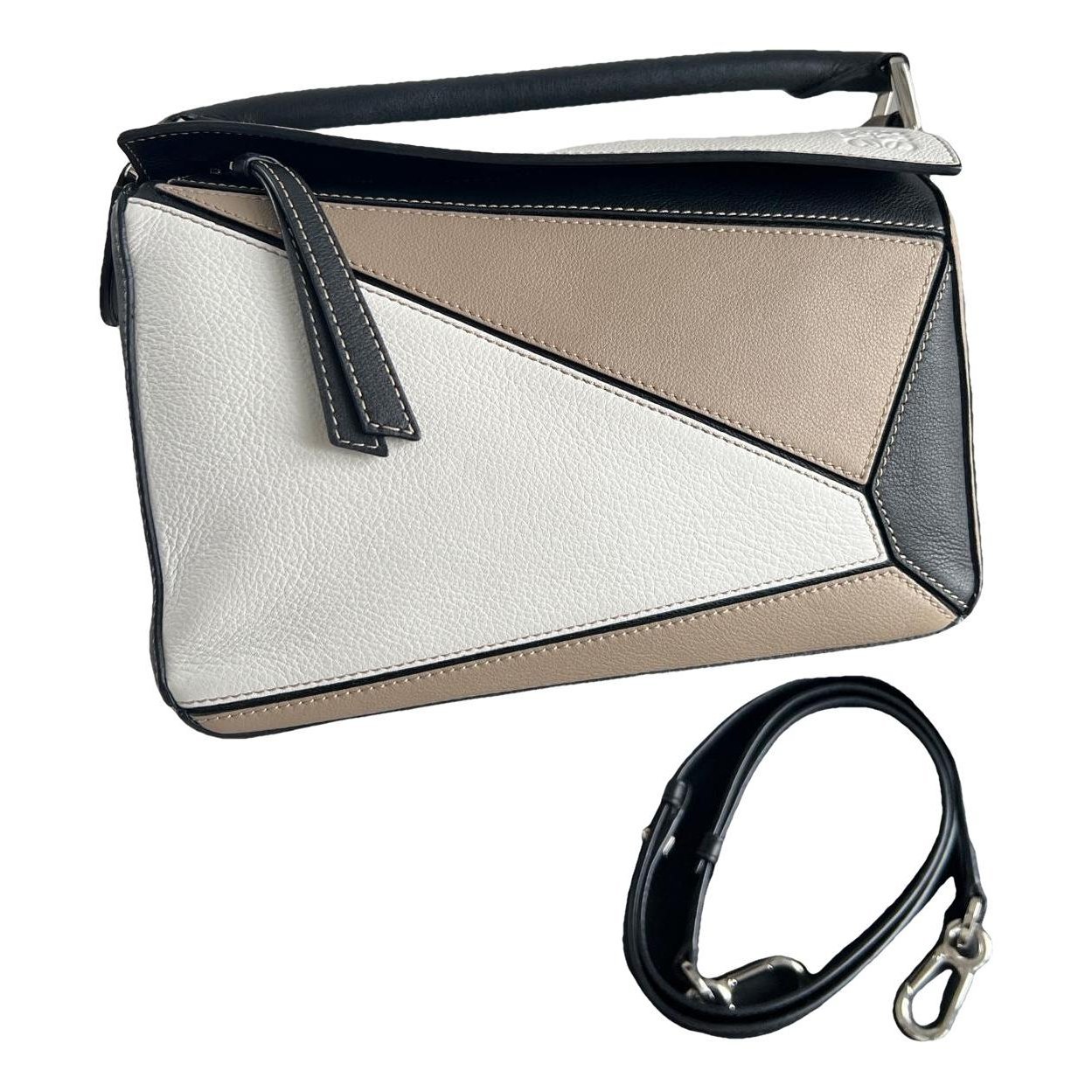 Puzzle leather handbag
