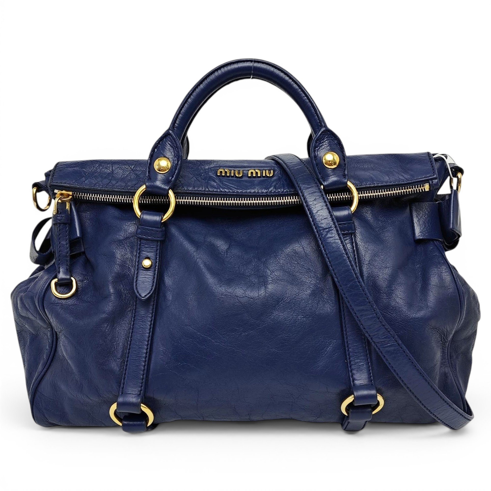 Bow bag leather handbag