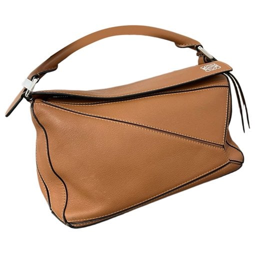 Puzzle leather crossbody bag