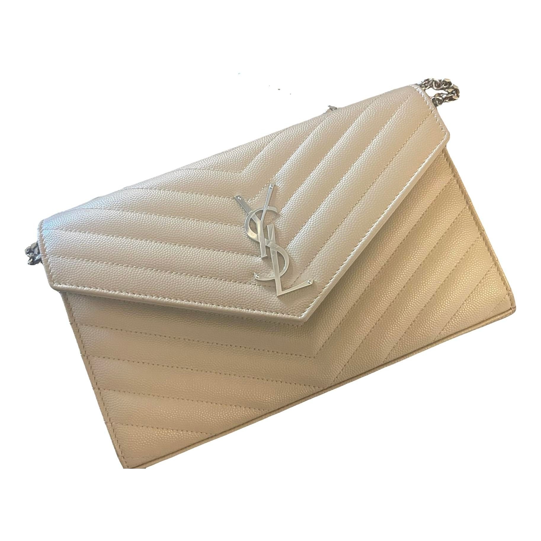 Cassandre leather clutch bag