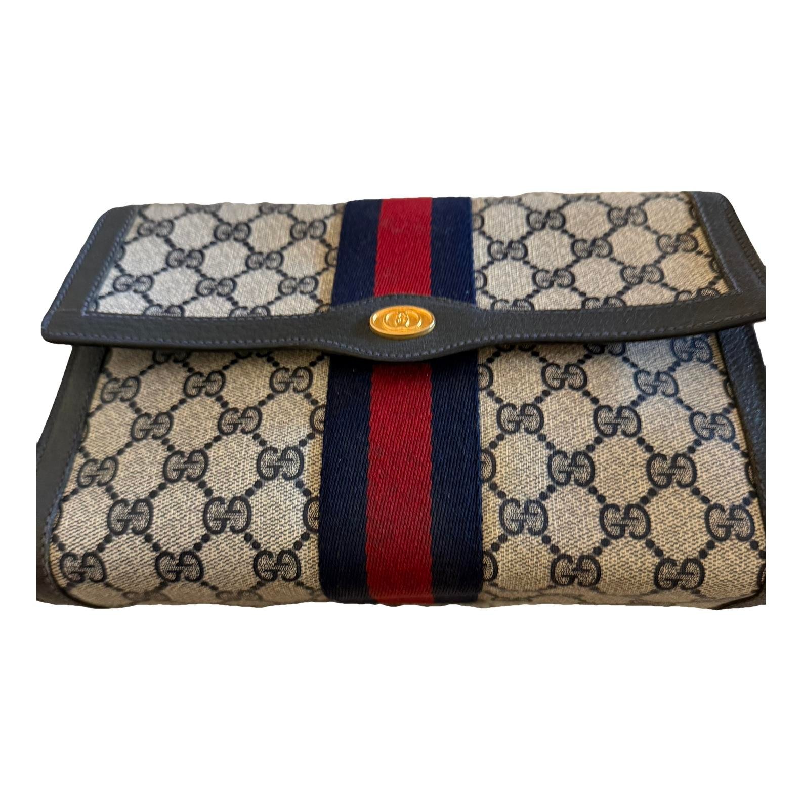 Ophidia leather clutch bag