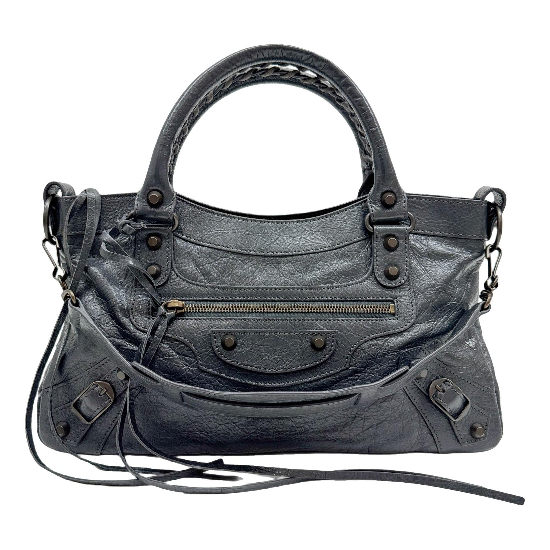 First leather handbag