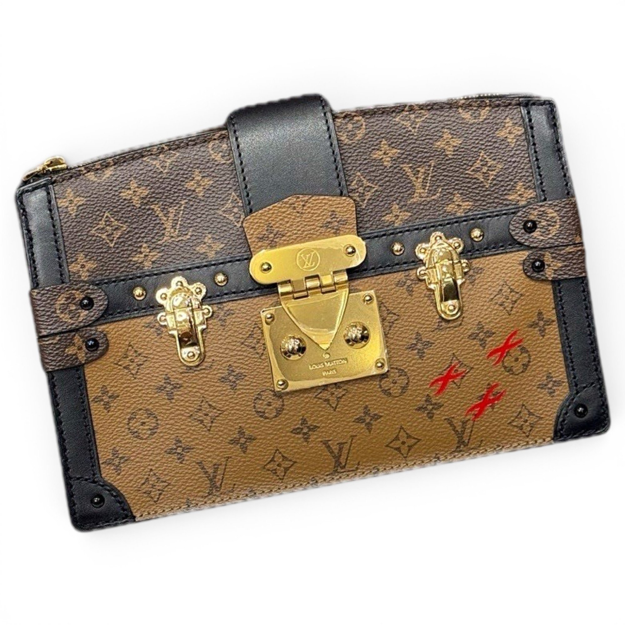 Pochette Trunk leather handbag