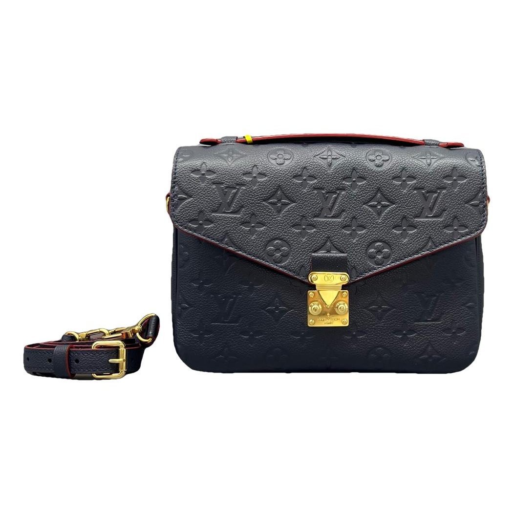 Multi-Pochette New Wave leather handbag