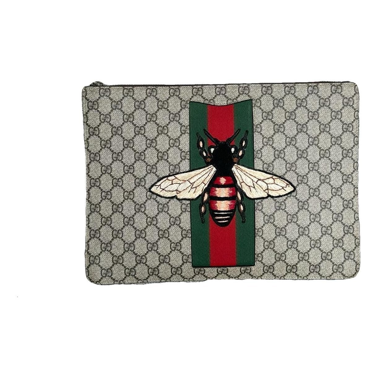 Ophidia cloth clutch bag