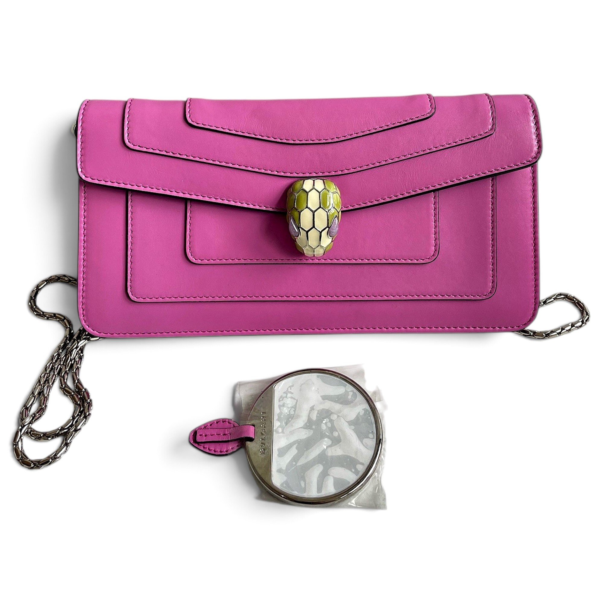 Serpenti leather clutch bag