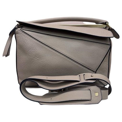 Puzzle leather handbag