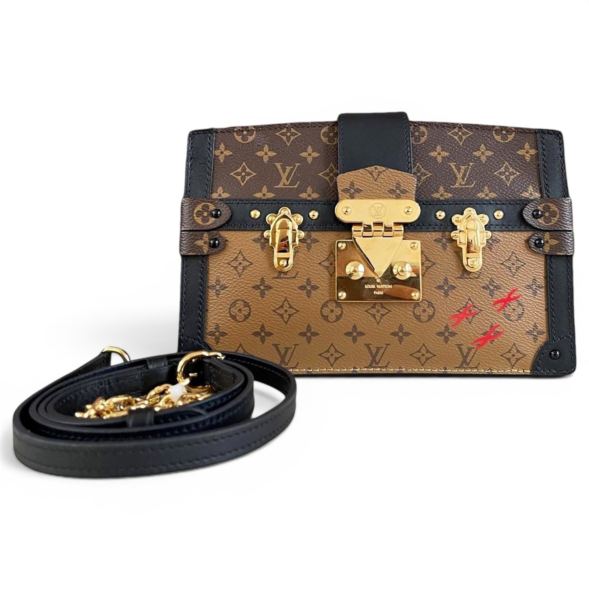 Pochette Trunk leather handbag