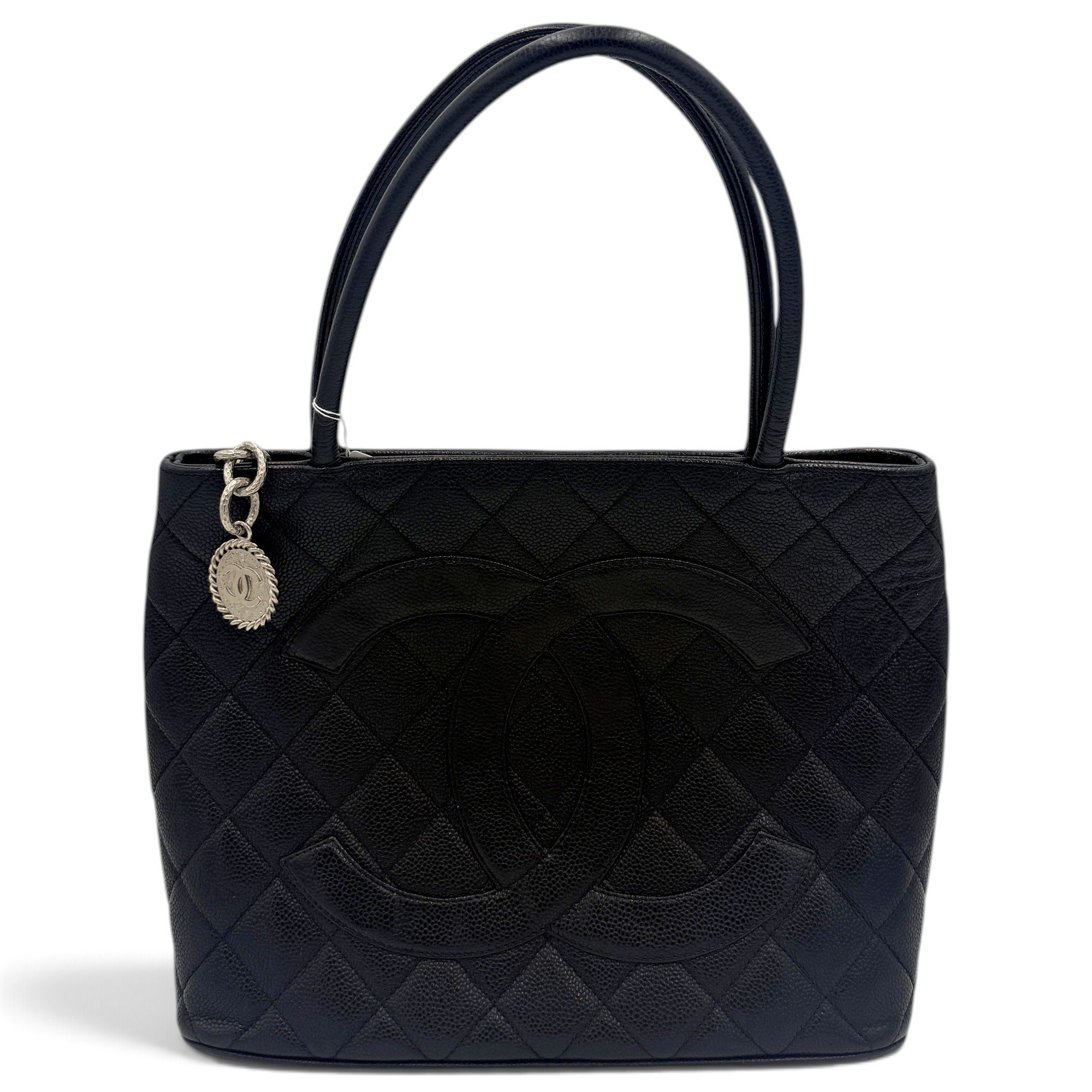 Médaillon leather handbag