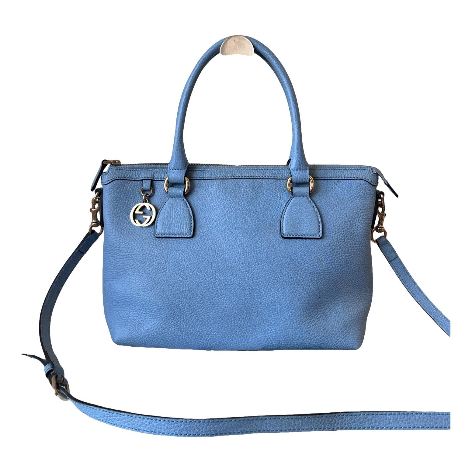 Interlocking leather handbag