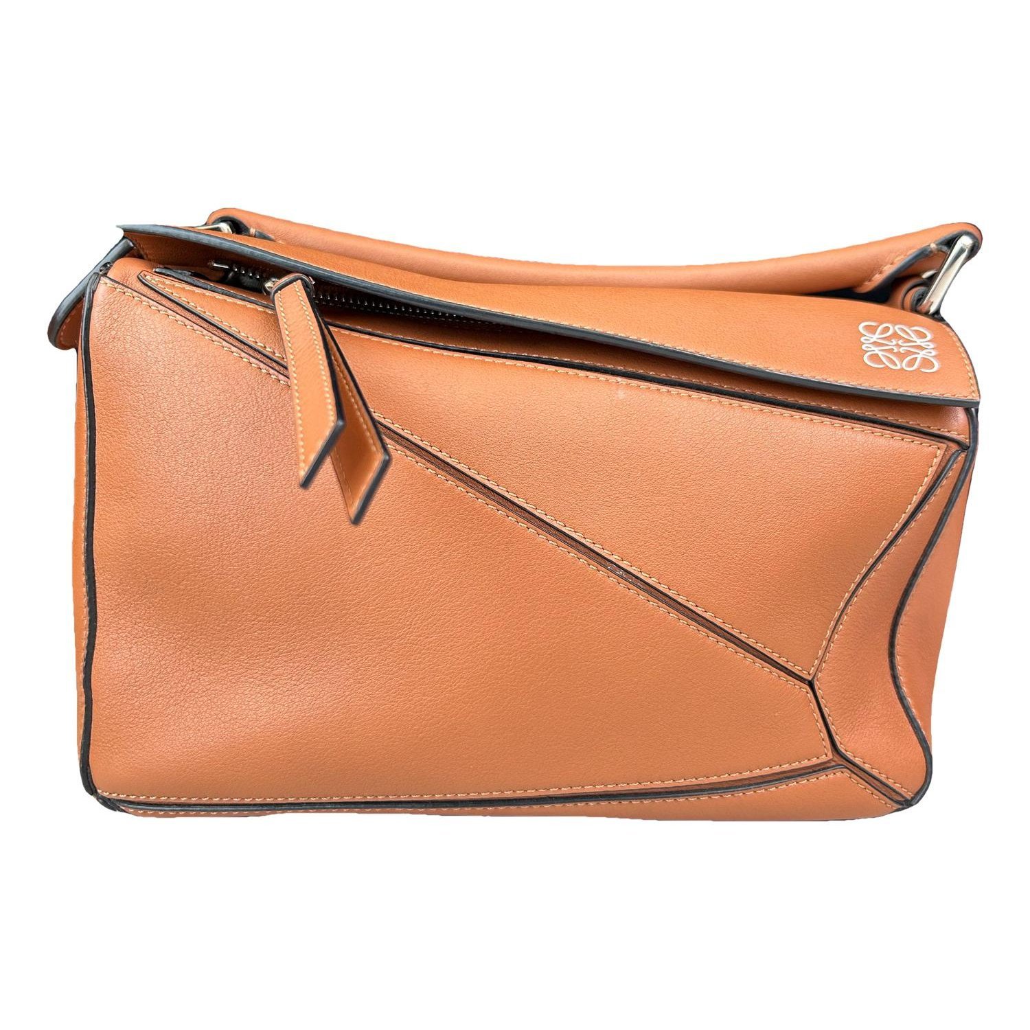 Puzzle leather handbag
