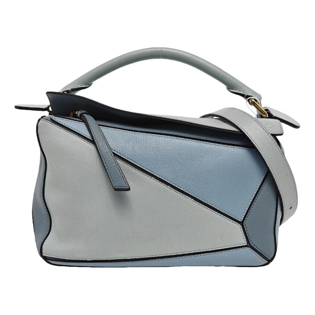 Puzzle leather handbag