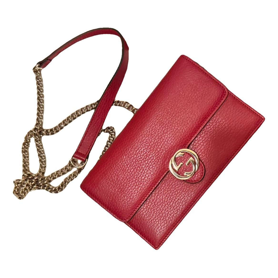 Interlocking leather clutch bag