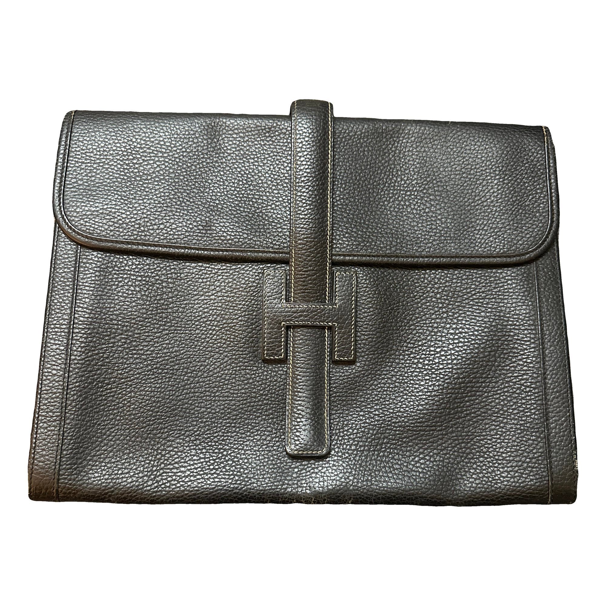 Jige leather clutch bag