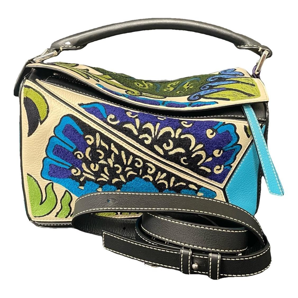 Puzzle leather handbag