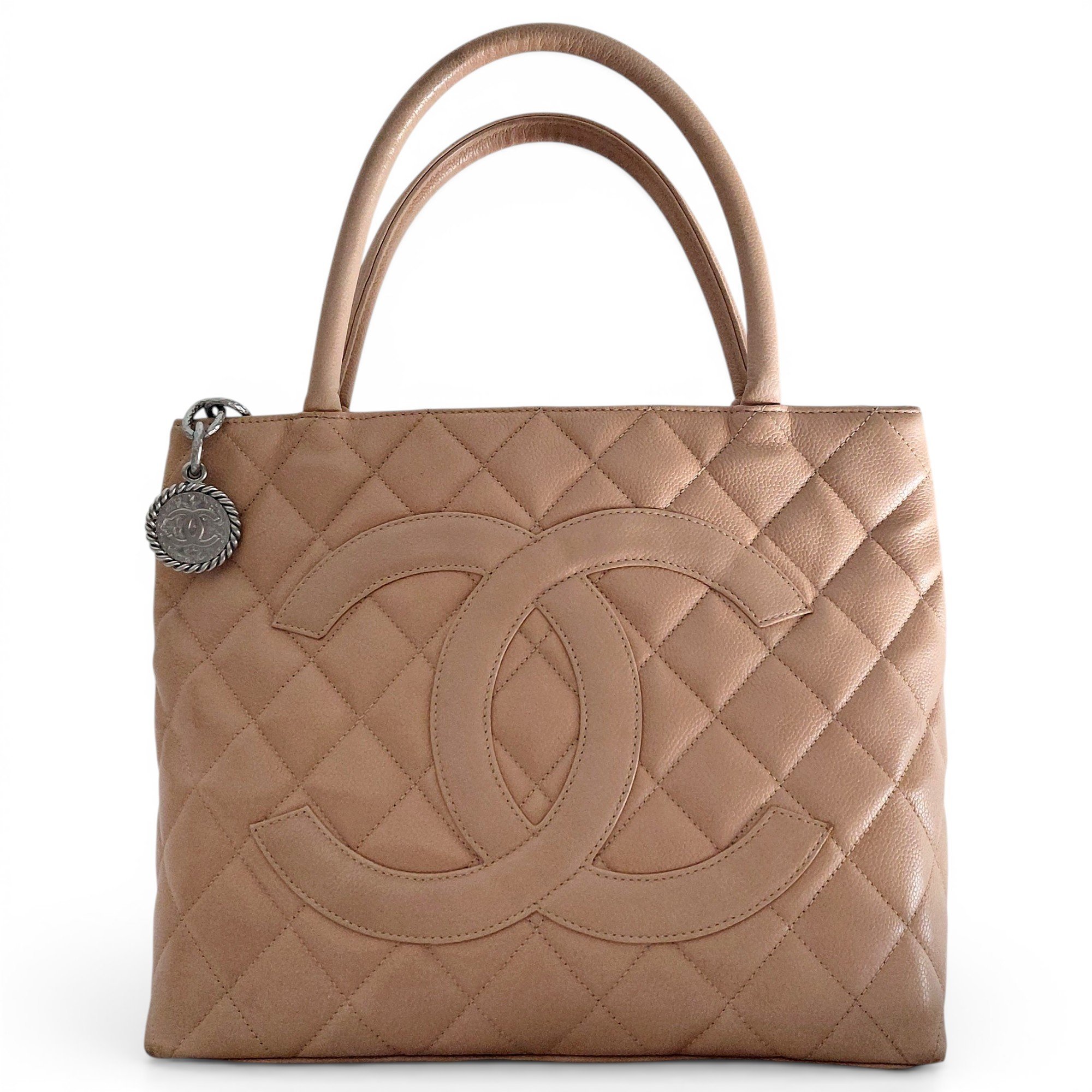 Médaillon leather handbag