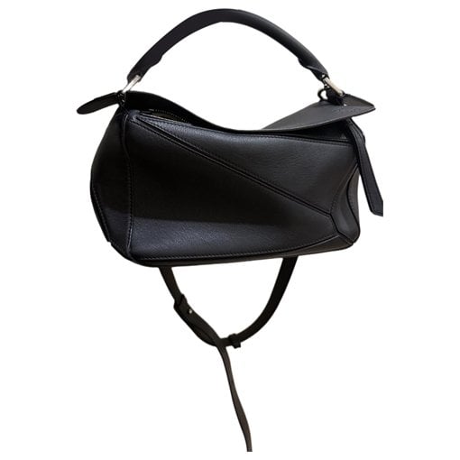 Puzzle leather handbag