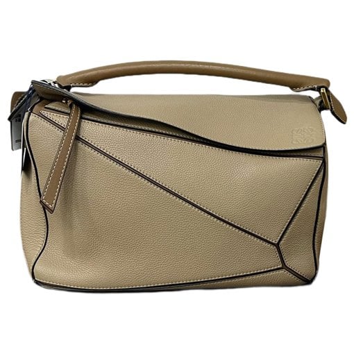 Puzzle leather handbag