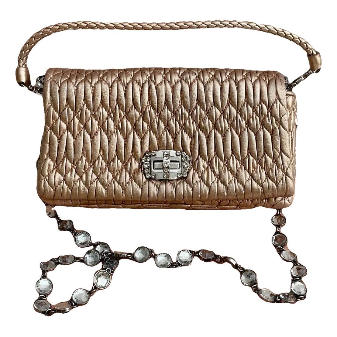 Miu Crystal leather handbag