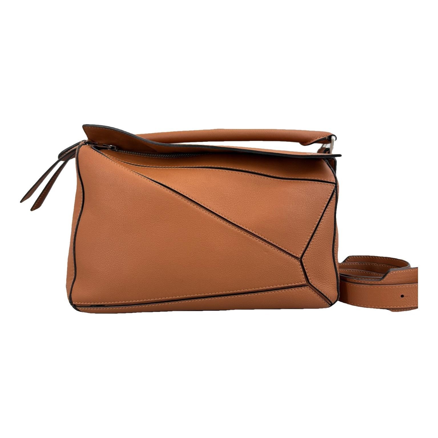Puzzle leather handbag