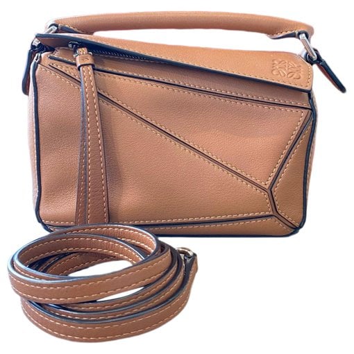 Puzzle leather handbag