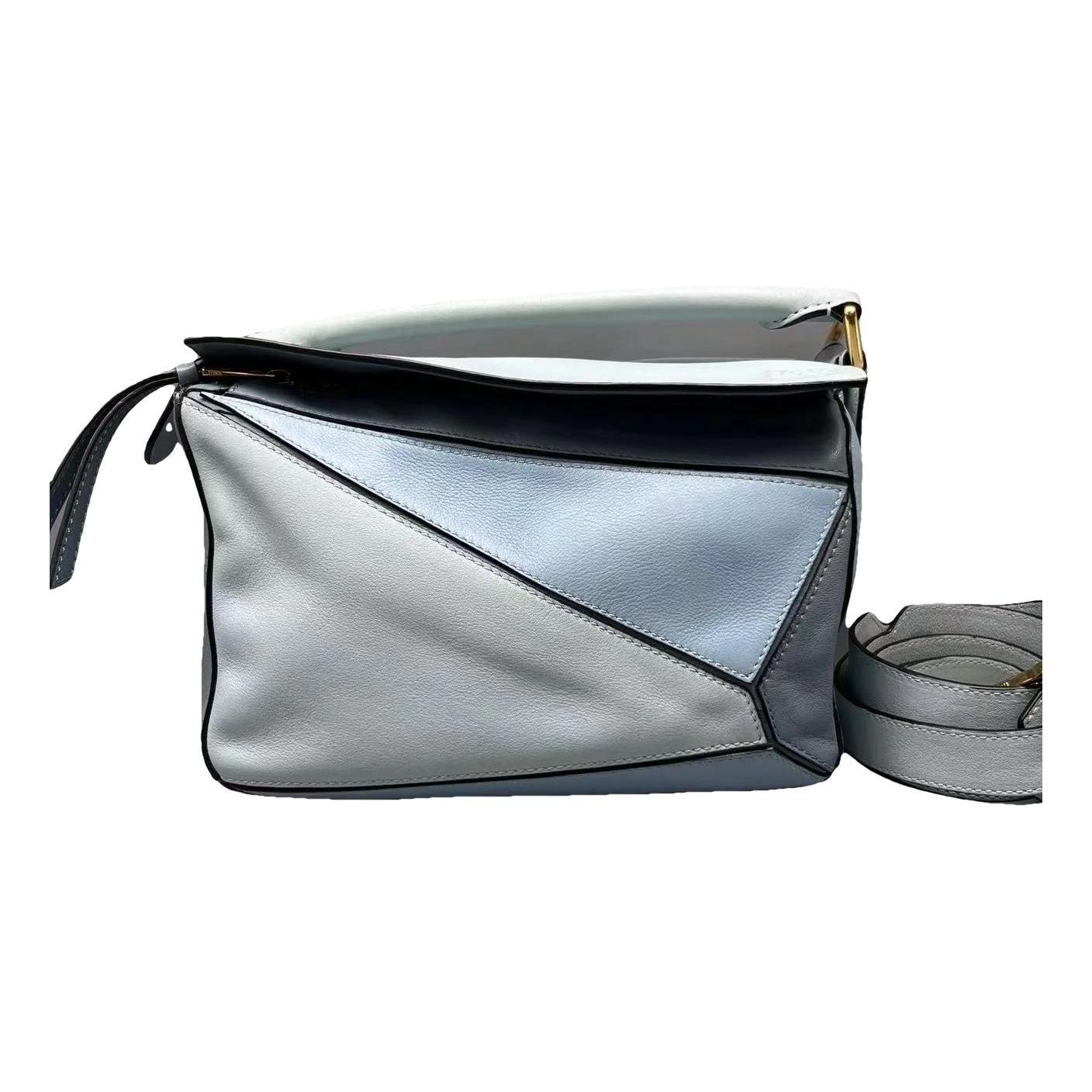 Puzzle leather crossbody bag