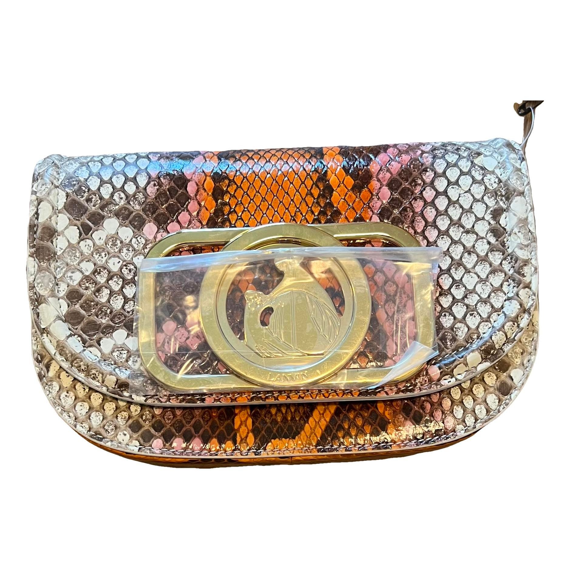 Pencil patent leather clutch bag