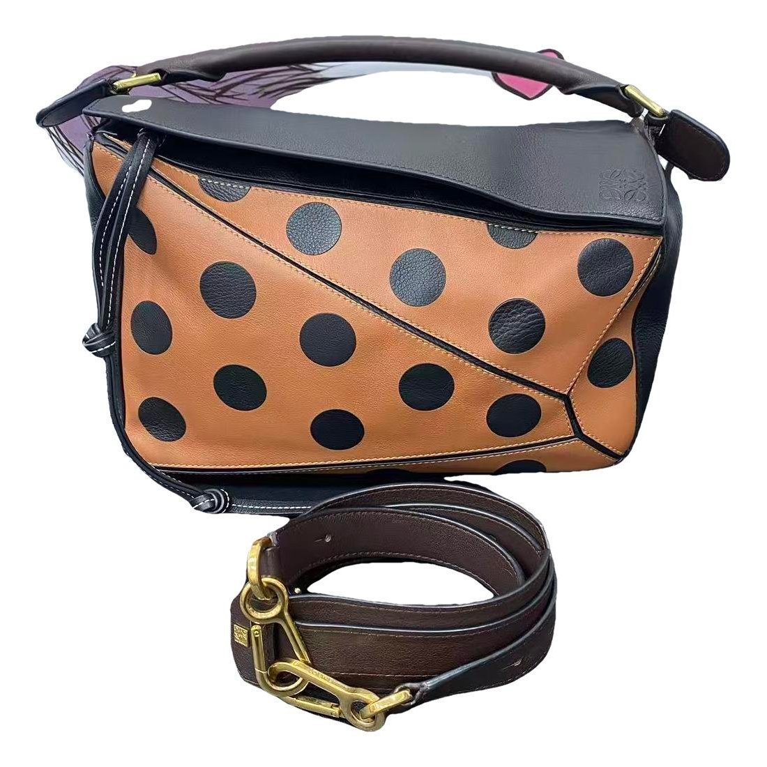 Puzzle leather handbag