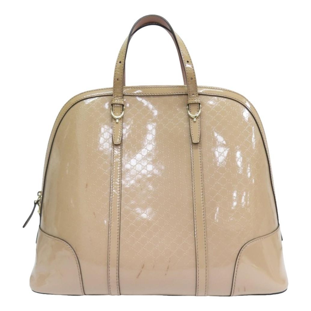 Dôme patent leather handbag