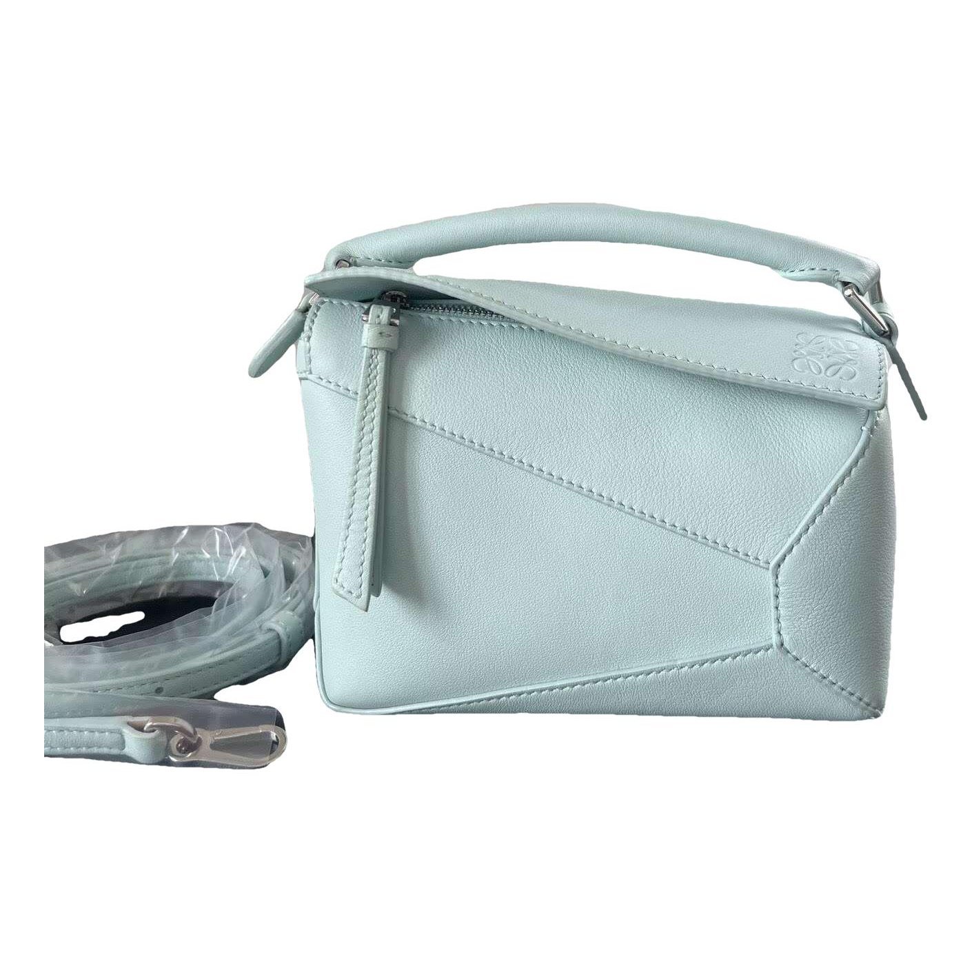 Puzzle leather handbag