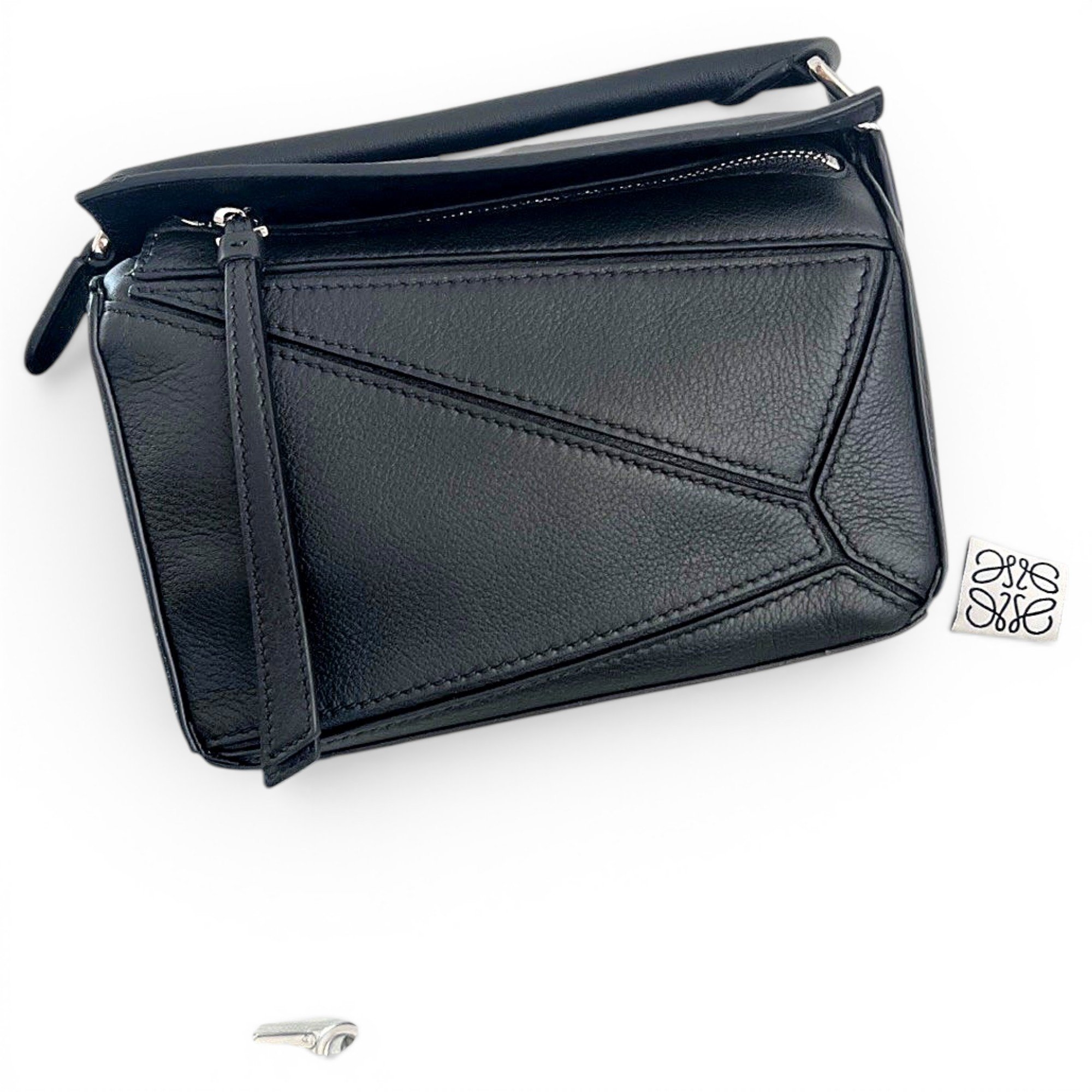 Puzzle leather handbag