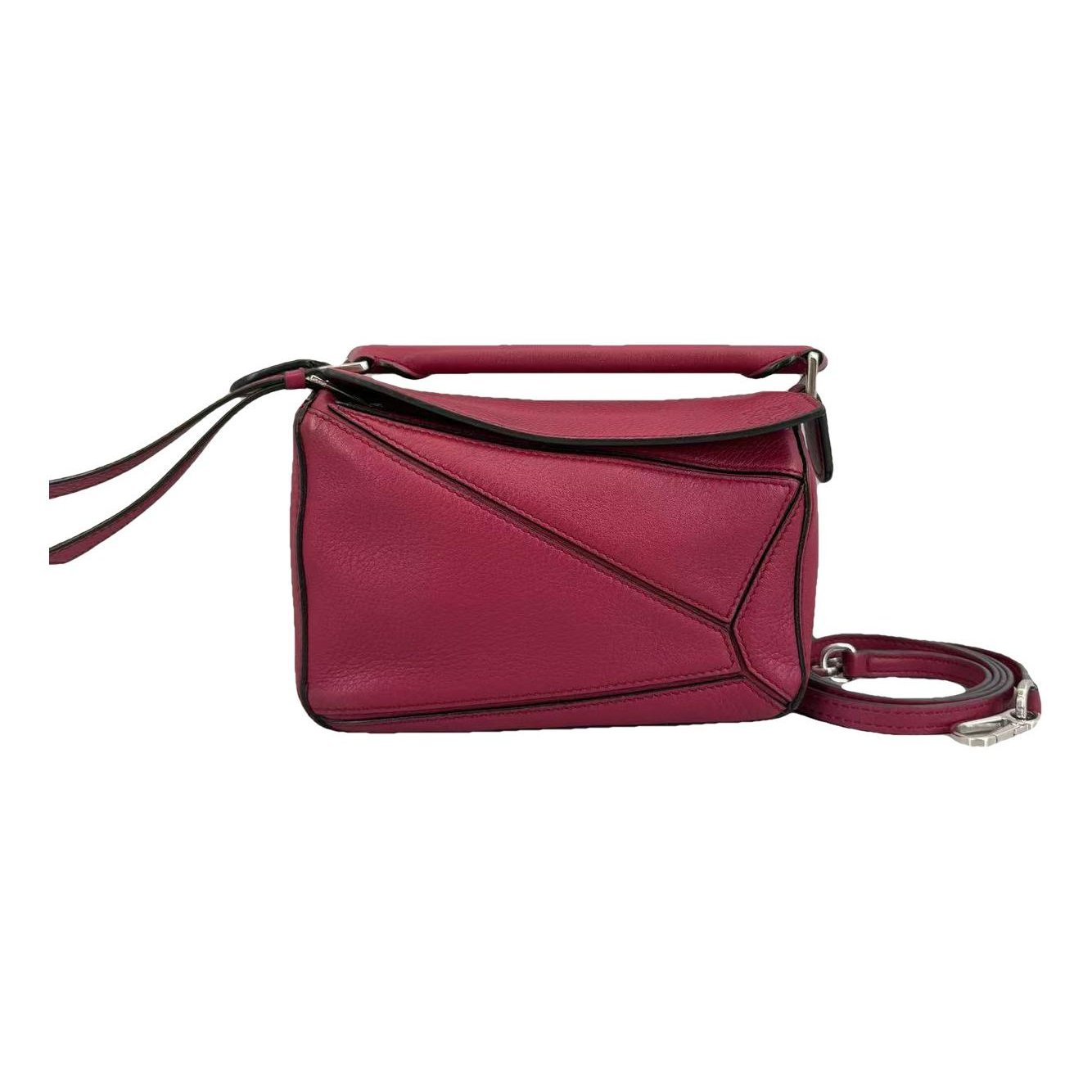 Puzzle leather handbag