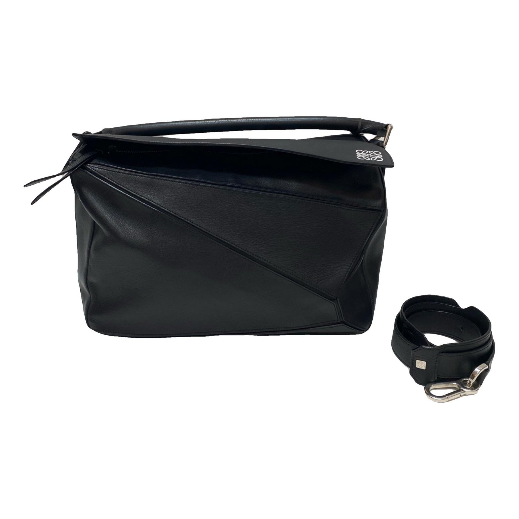 Puzzle leather handbag