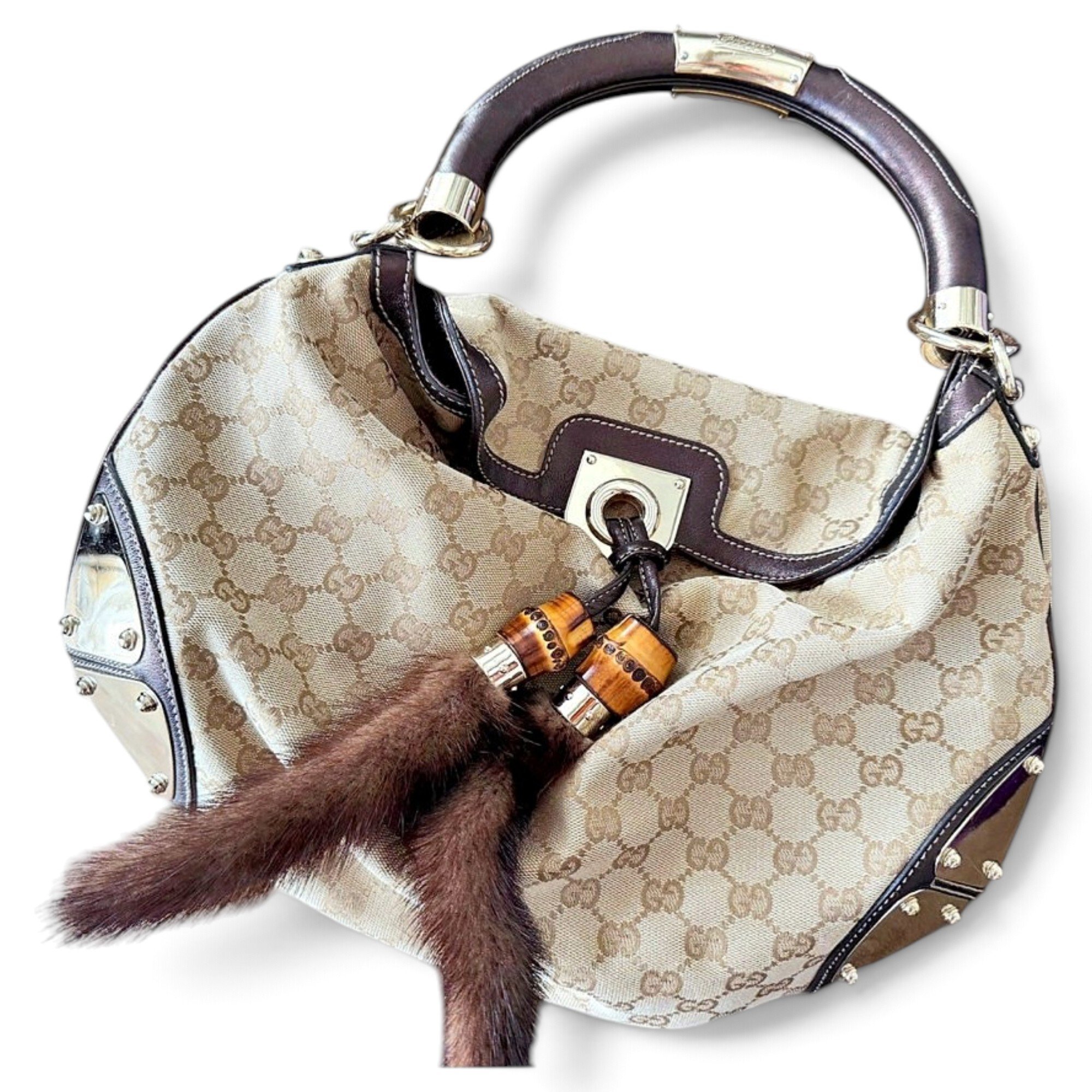 Convertible Pompon Bamboo Top Handle leather handbag