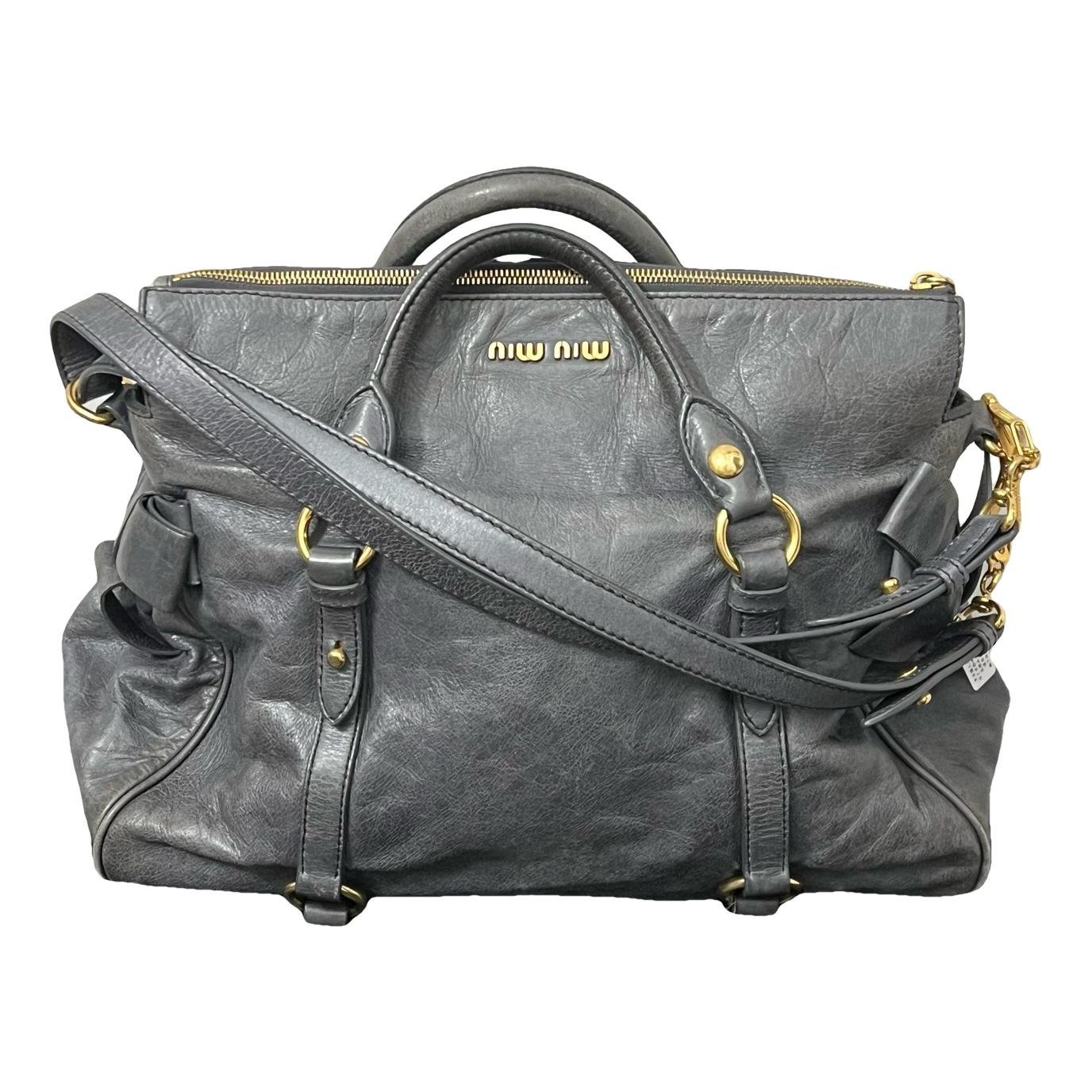 Bow bag leather handbag