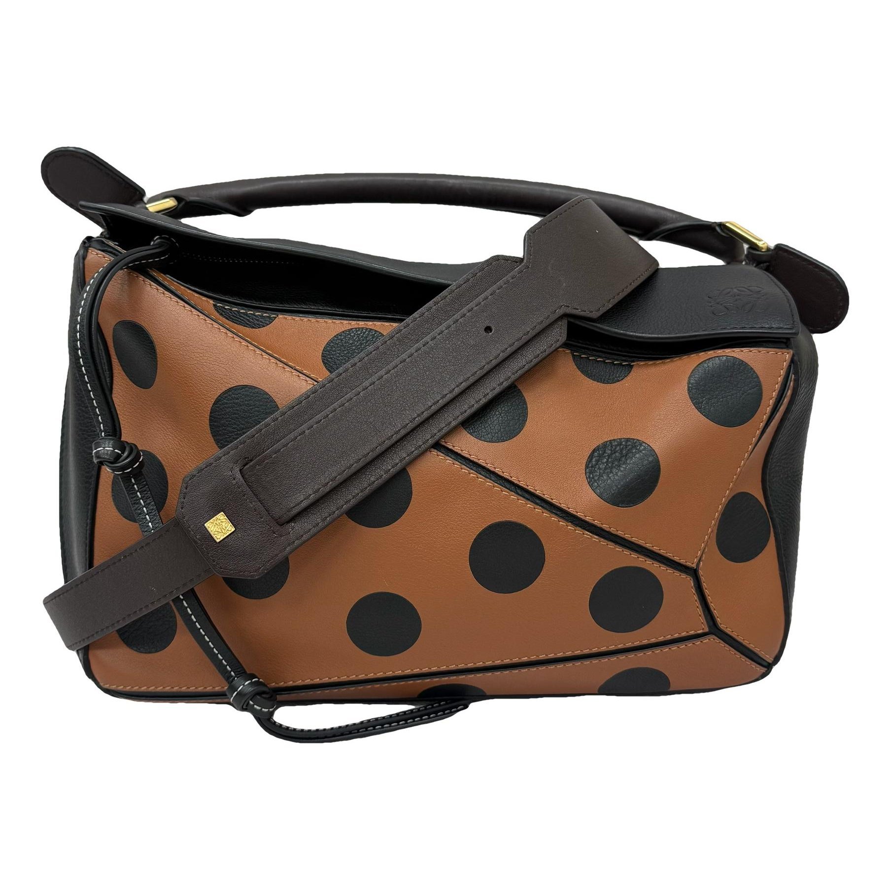 Puzzle leather handbag