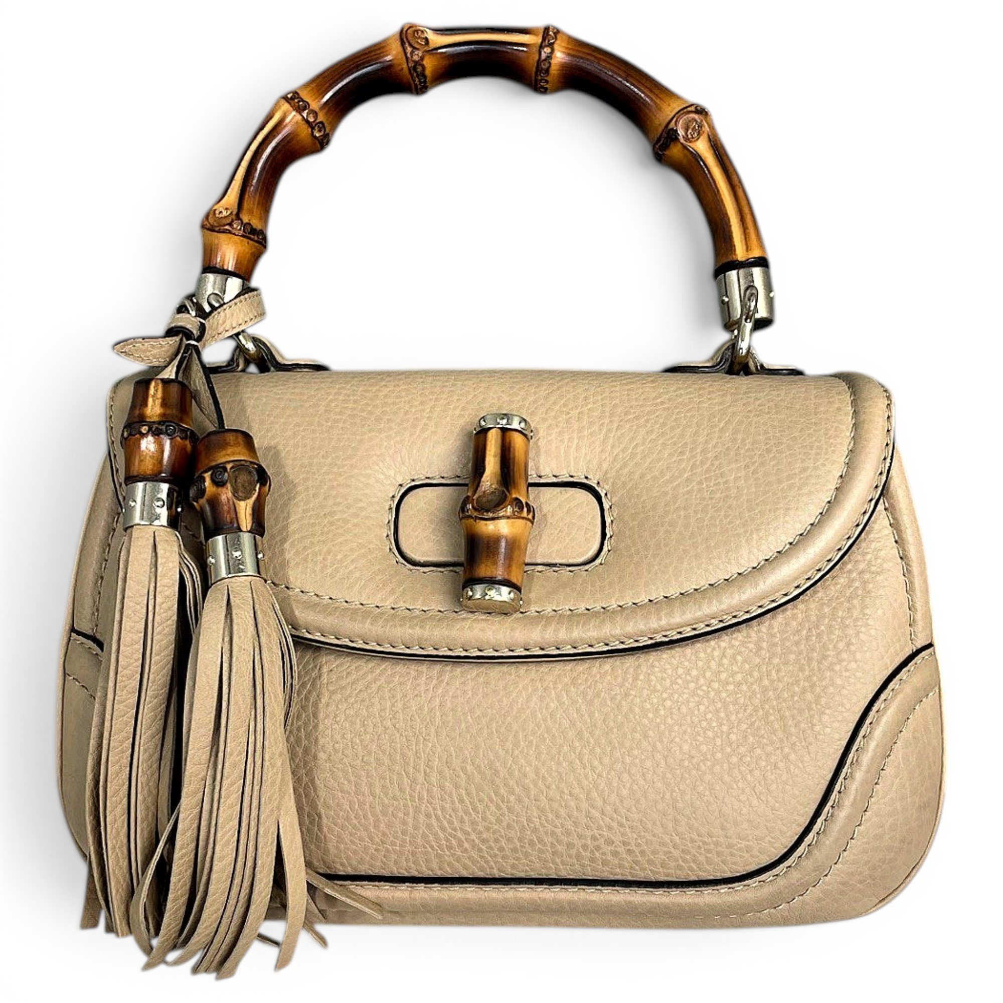 Convertible Pompon Bamboo Top Handle leather handbag